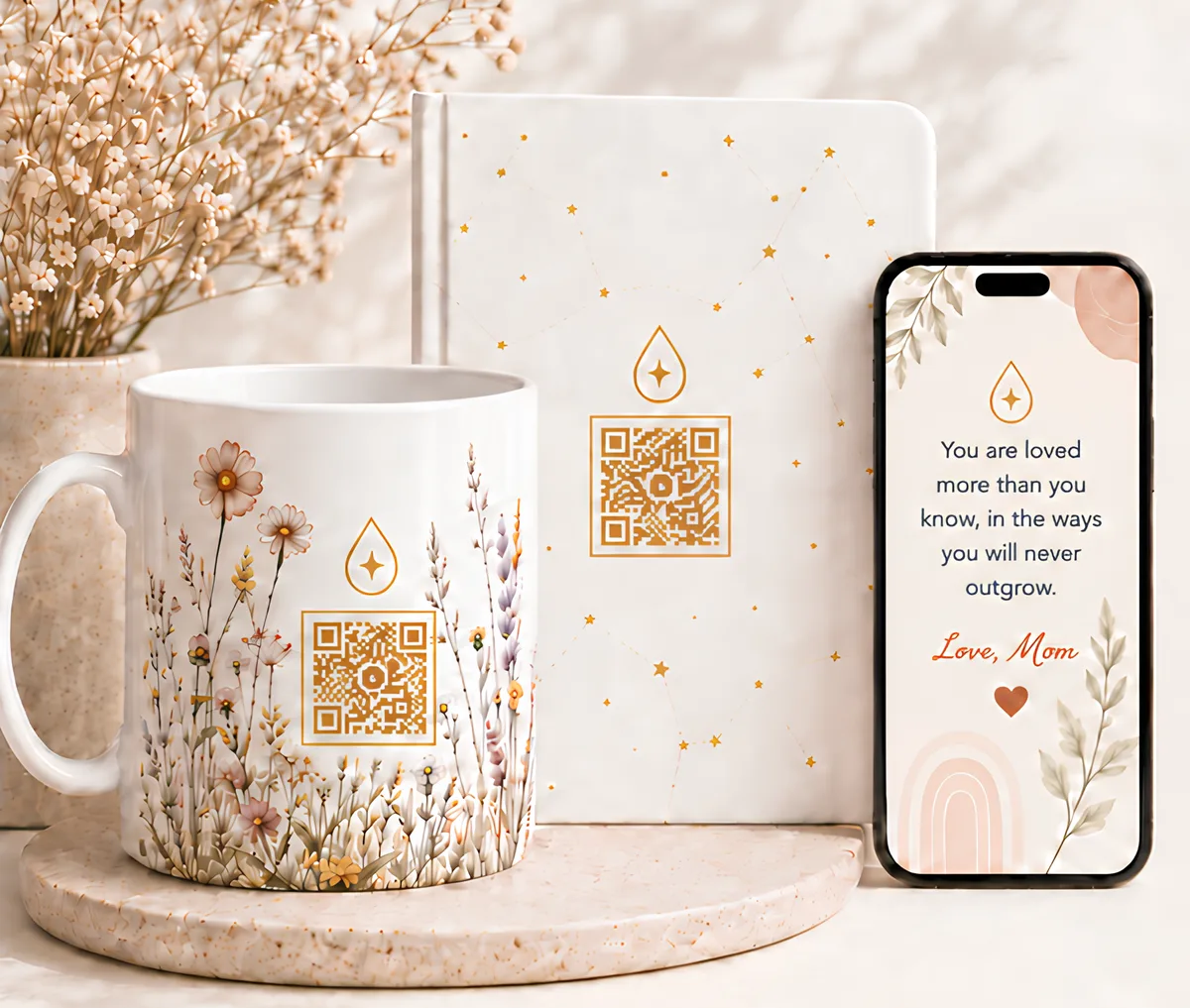 A Wonder Drop mug and journal beside a phone showing today's note
